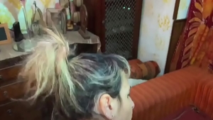 Slut masturbates with big dildo